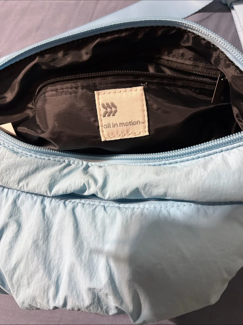 Light Blue never used Women's Crossbody Sling Bag by all in motion. Nice